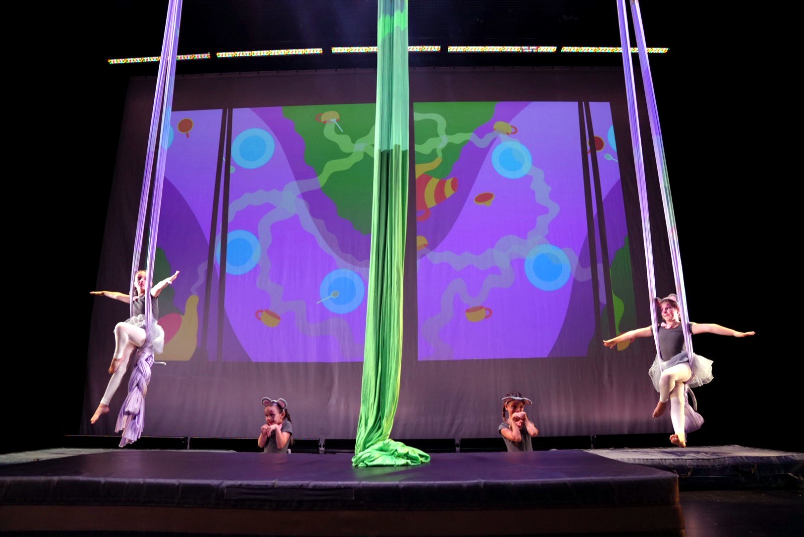 Group routine with aerial silks